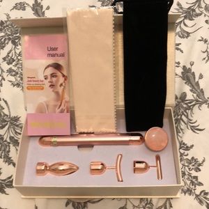 New never used energy beauty bar facial massager includes 4 different tops